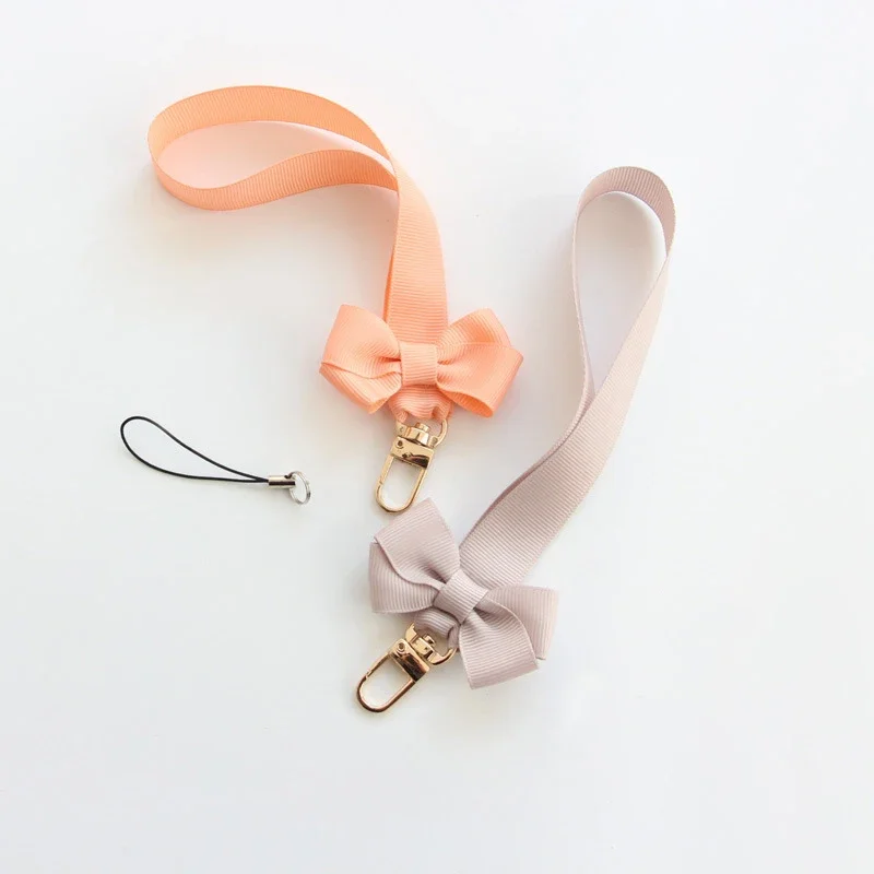 Trendy Bowknot Mobile Phone Ch - Fashion Women Picture recension och pris