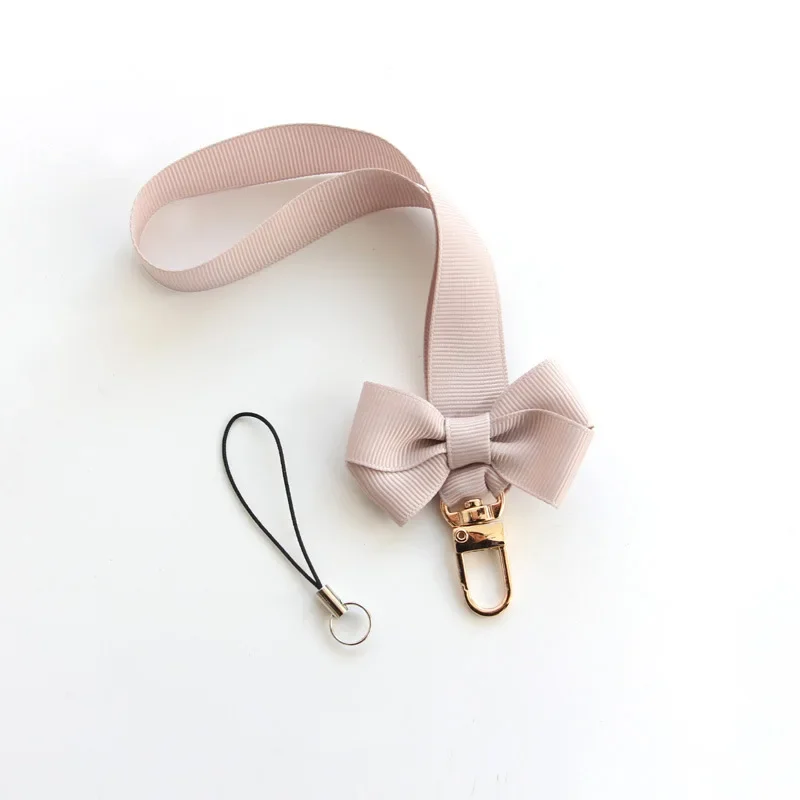 Trendy Bowknot Mobile Phone Ch - Fashion Women Picture recension och pris